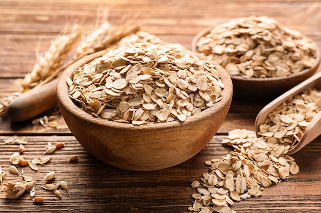 bowl with oat flakes wooden table